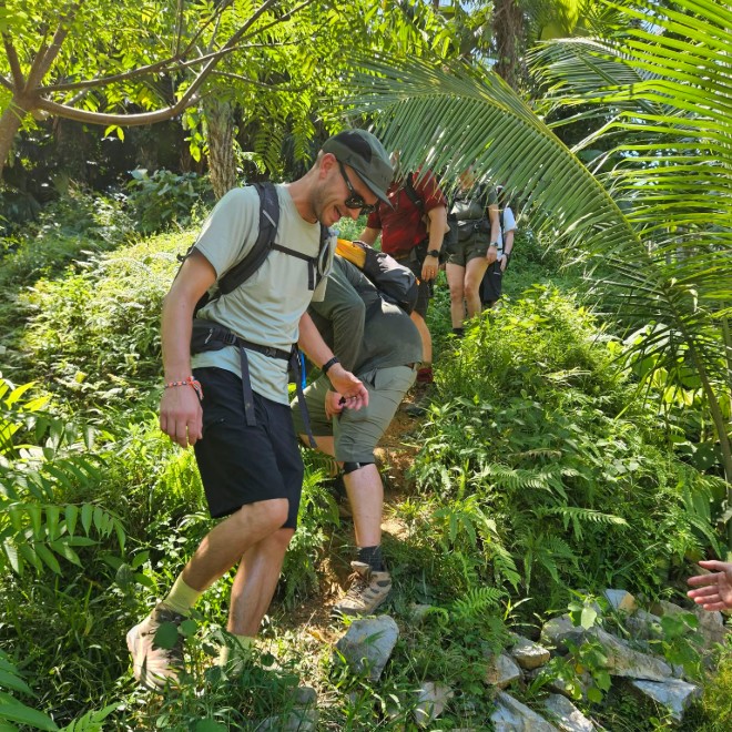Matt Hoar makes his way through jungle-like fauna on Vietnam trek